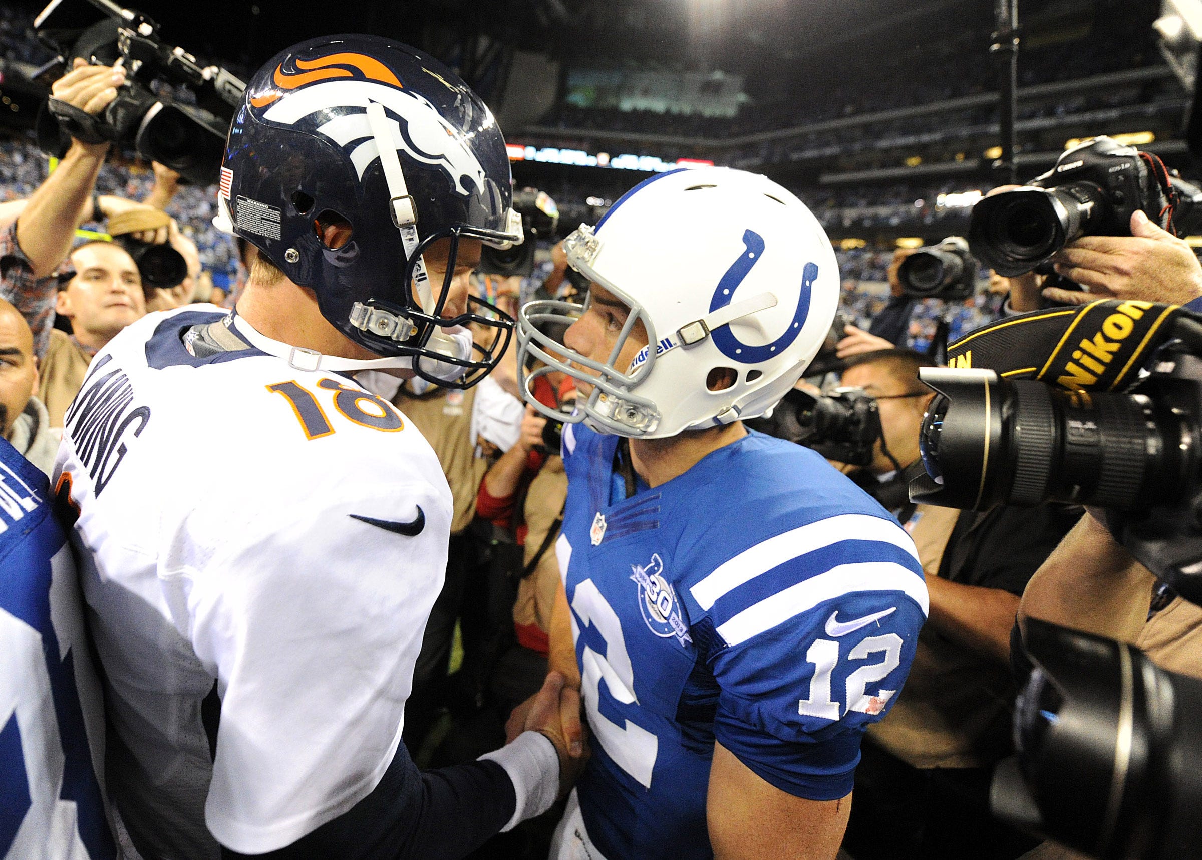 manning jersey half colts half broncos